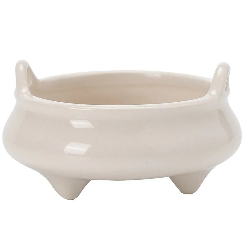 

Chinese style three-legged binaural small incense burner nine-hole incense burner tea room household white porcelain ornament