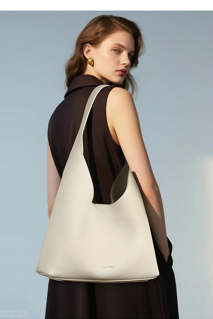 

Brand women's top layer cowhide casual tote bag, trendy and simple women's single-shoulder bag, new commuter large bucket bag