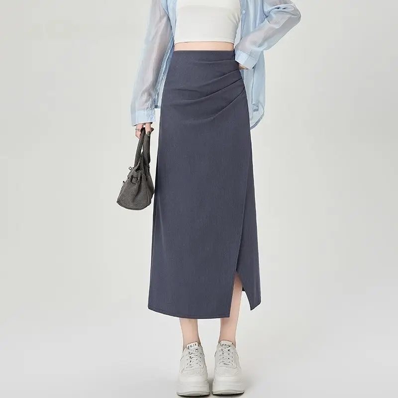 Hip-wrapped half-length dress women's autumn thin super-fire suit skirt 2025 new high-end exquisite split-ended one-step skirt