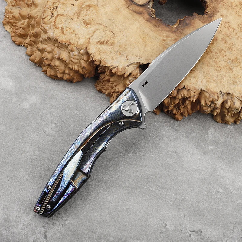 

M390 steel blade, titanium alloy handle, folding knife, outdoor self-defense, camping, hiking, cutting, survival, portable tool