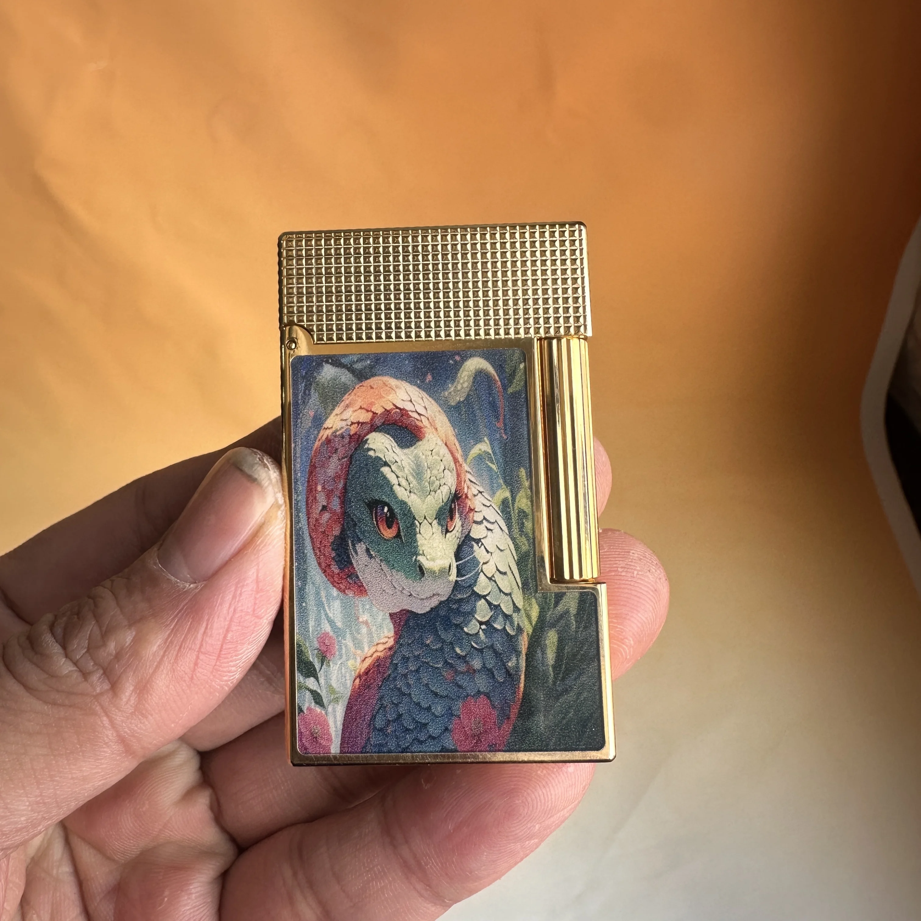

Luxury brand custom-made lighter, Year of the Snake limited edition, includes customized consumables.