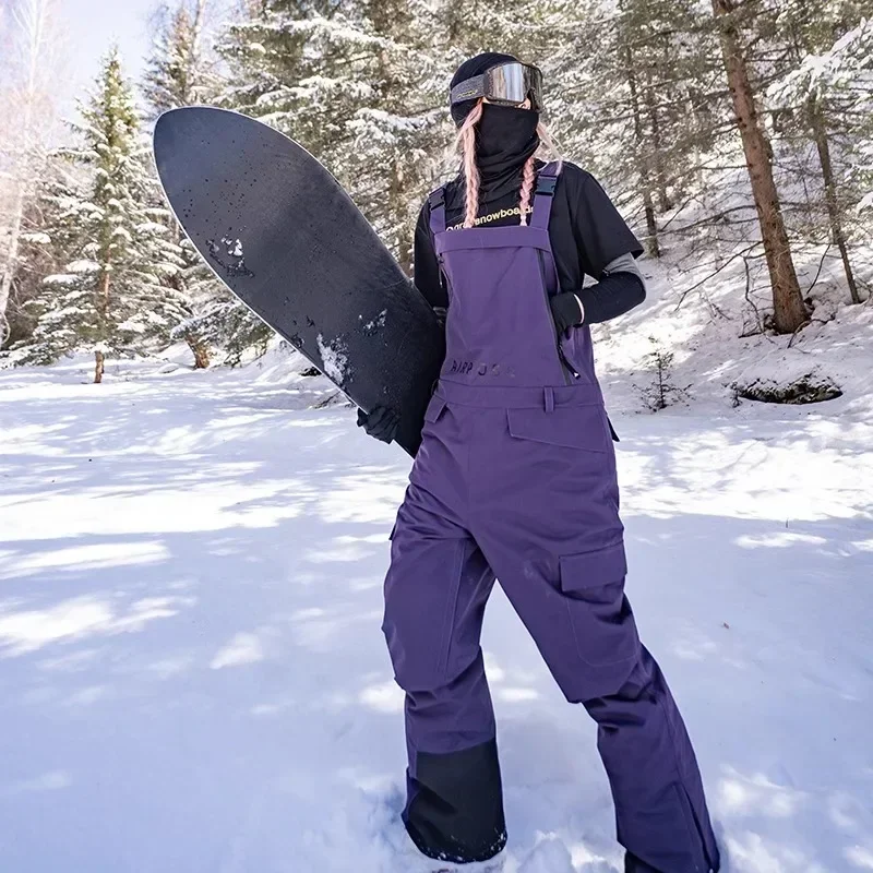 Calças de esqui impermeáveis e à prova de vento para homens e mulheres, macacão de esqui esportivo snowboard, quente, inverno, novo