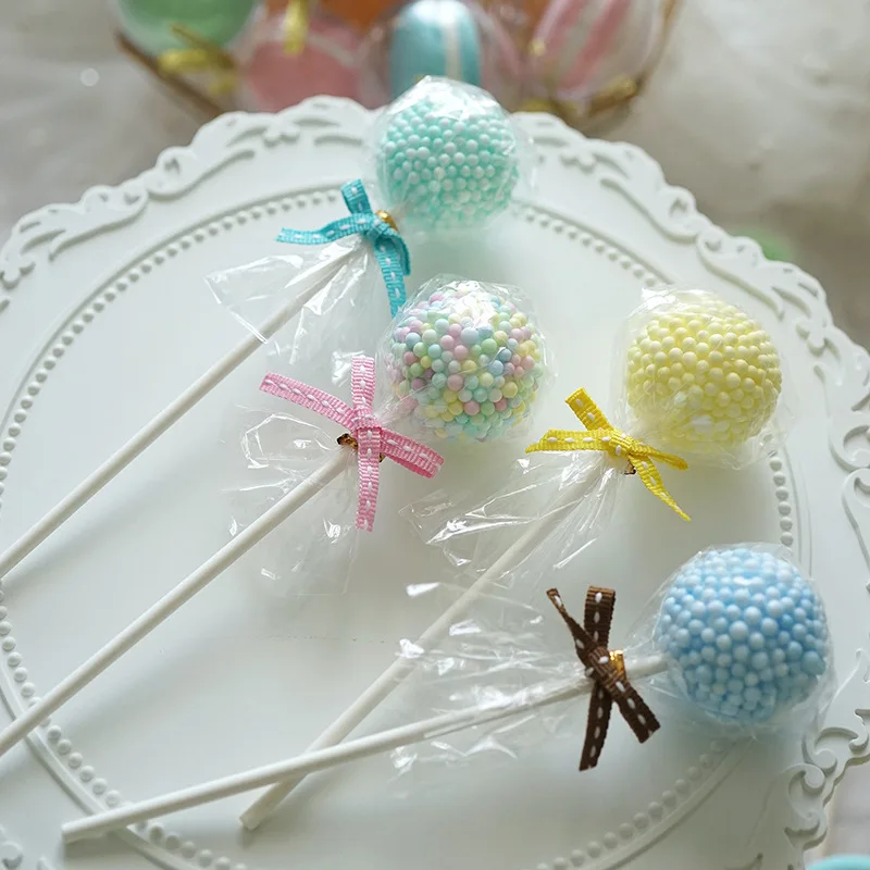 Niedliche Künstliche Süßigkeiten-Requisiten Simulierte Sesamball-Lollipops Modell Hochzeits-Macarons Dessert-Ornamente Fotografie-Requisiten DIY Heimdekoration