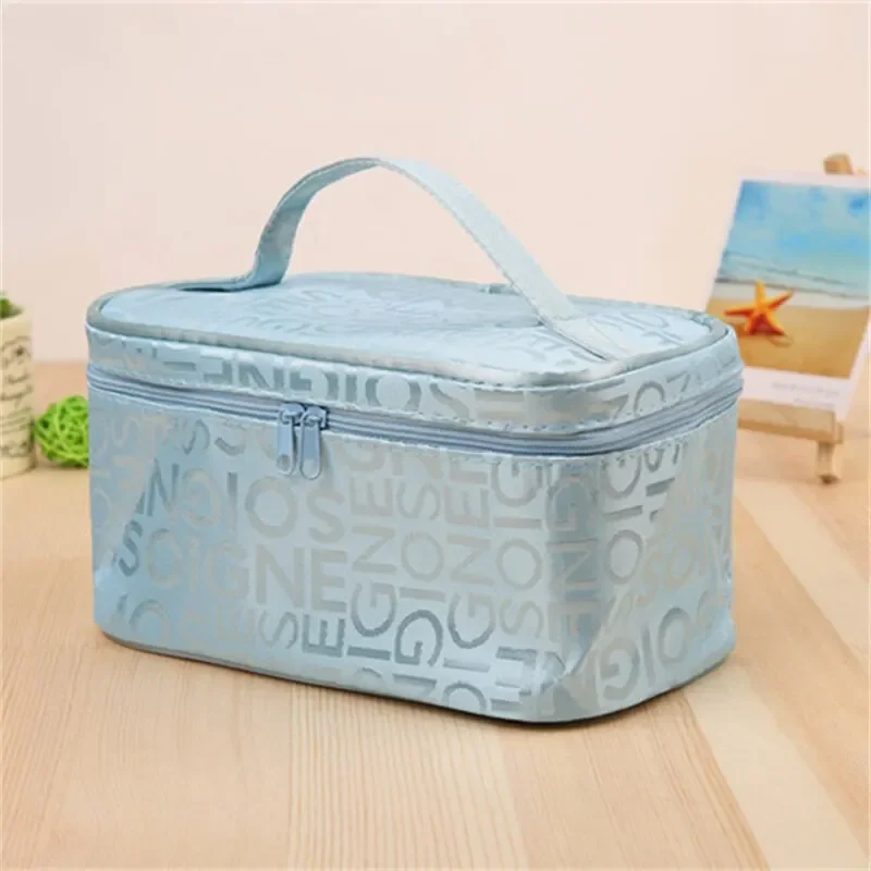 Borsa per il trucco Jacquard con lettera impermeabile portatile da donna nuova borsa da toilette portatile da viaggio rettangolare di moda