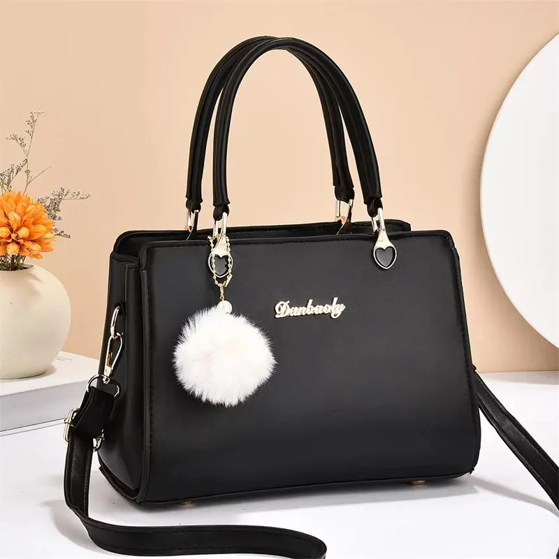 Mulheres Plush Ball Decor Handbag Moda Satchel Bag Bolsa elegante e sacola PU Leather Top Handle Shoulder Bags