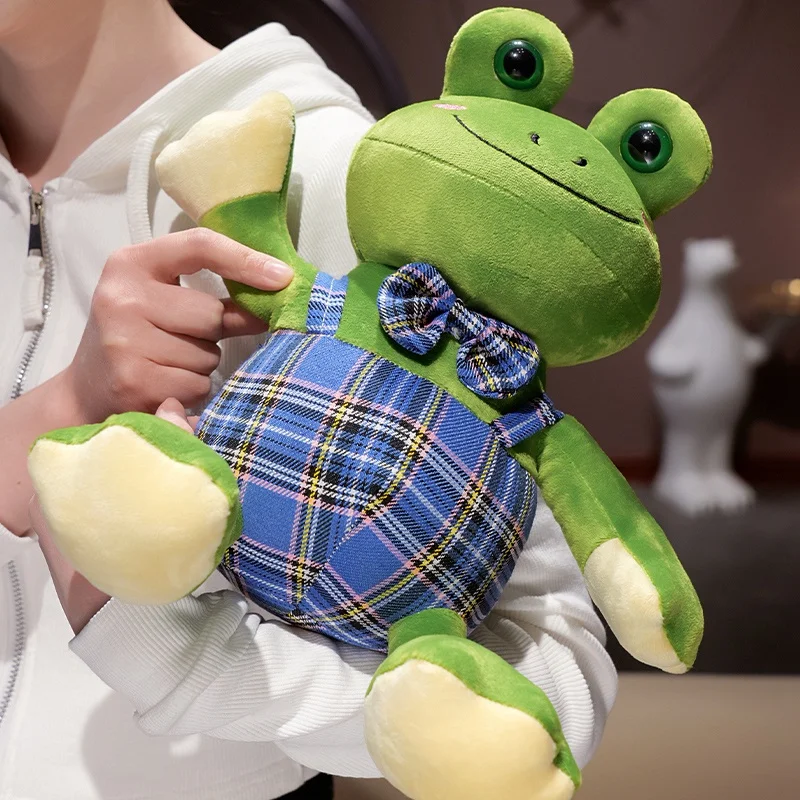 27 سنتيمتر الكرتون لطيف الحيوان الضفدع أفخم دمية شهم ربطة القوس فيونكة الغيتار الضفدع الزواحف ألعاب من نسيج مخملي هدية تزيين المنزل للأطفال