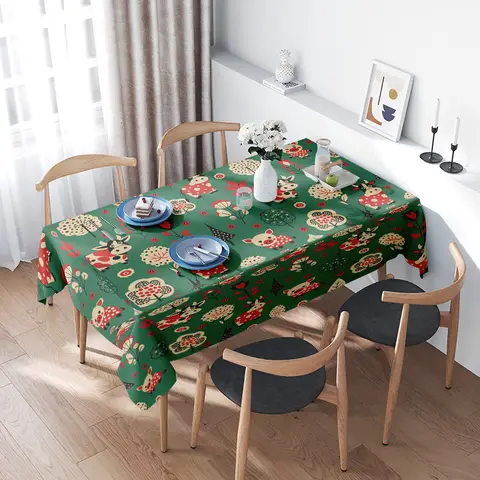Tovaglia decorativa realizzata in cotone 100% dal design a tema natalizio con graziosi gufi, adatta per l'uso in cucina o din