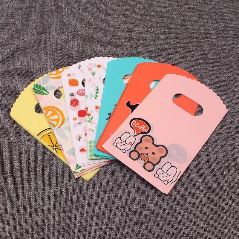 50Pcs/Lot 9x15cm Small Bow Gift Plastic Bags Boutique Shopping Candy Gift Packaging Bag with Handles Jewelry Packaging Bag