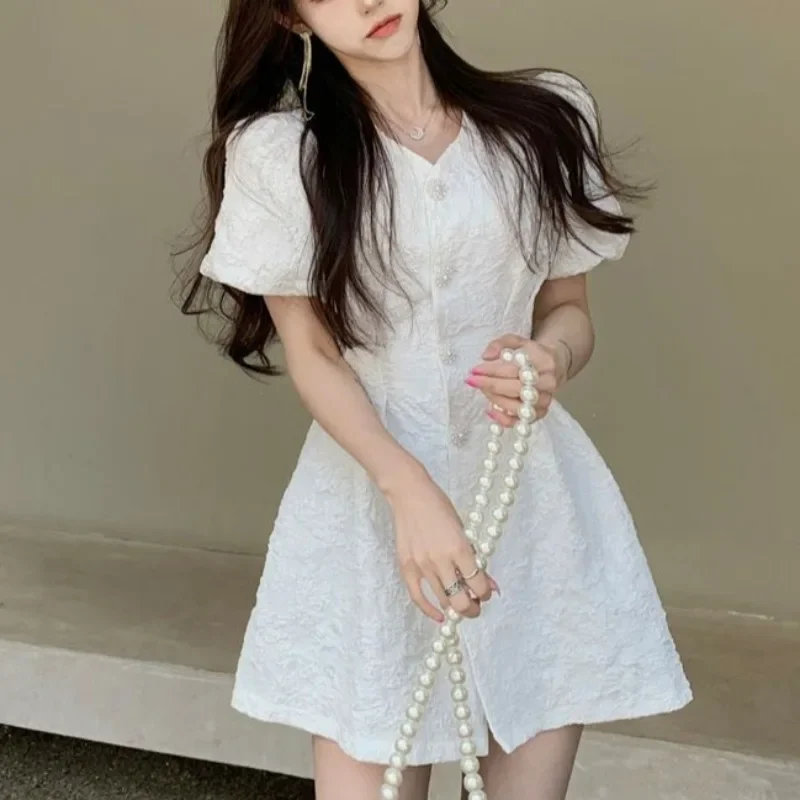 ฤดูใบไม้ผลิฤดูร้อนดอกไม้สีขาวสดชุดสั้นสําหรับผู้หญิง Elegant พัฟฝรั่งเศสแขน Single-breasted ชุดเดรสมินิ Vestidos