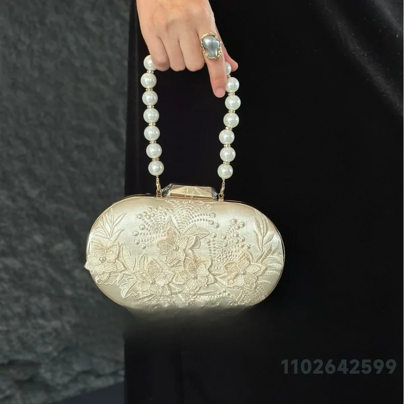 2026 New Women's Handbag Fashion High Quality Pearl Lace Women's Bag Advanced Retro Versatile Party Banquet Mouth Red Envelope