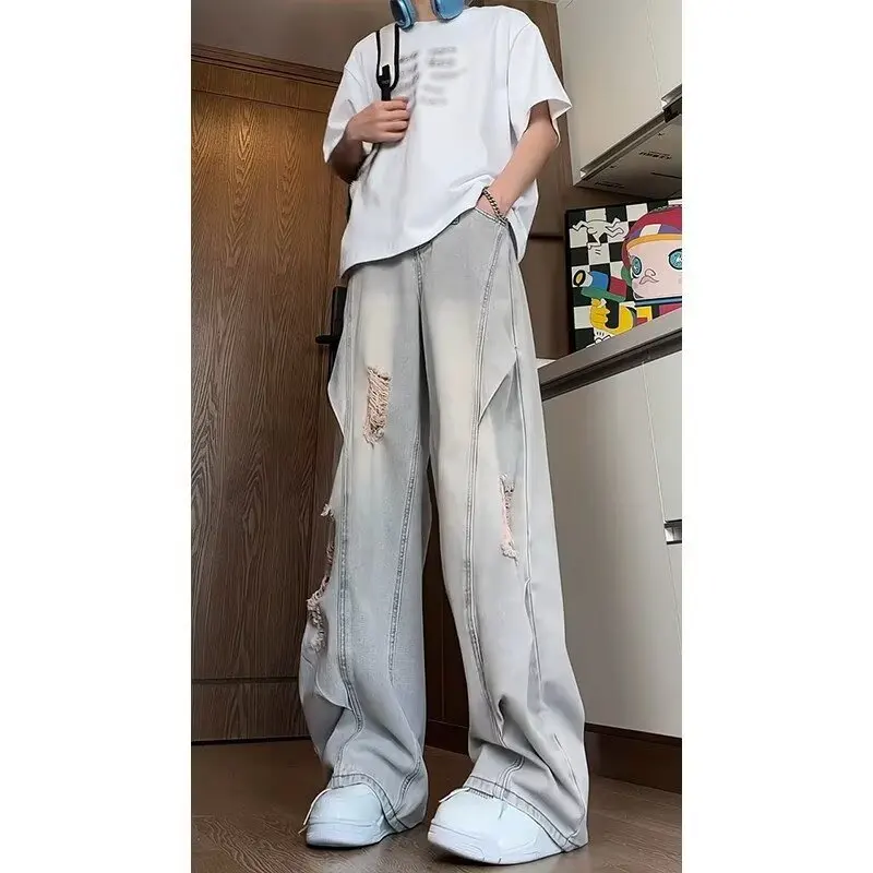 جينز ممزق مغسول باللون الأزرق للرجال صيفي أمريكي عالي الشارع فيبي سروال فضفاض واسع الساق