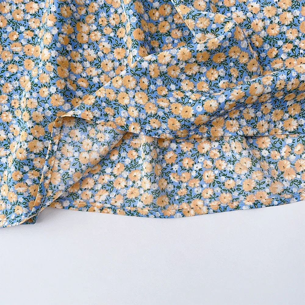 فساتين Bear Leader الصيفية العصرية للفتيات بأكمام قصيرة وطية صدر السترة وديكور فيونكة فستان مطبوع عليه زهور