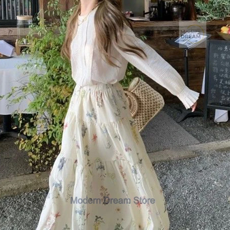 French printed drawstring bud skirt women's spring and summer new fashion high waist slim floral temperament long skirt.