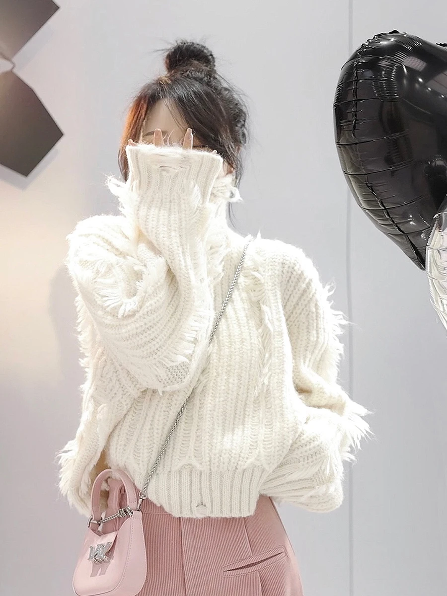 

Autumn Winter 2026 Chic Solid Color Loose Hole Tassel High Neck Long Sleeved Sweater Soft Elastic Women's Knitted Pullover Top