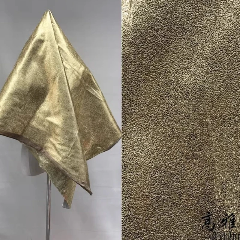 

Gold-Colored Soft Textured Coating With Subtle Pop, Resembling Glossy Leather Fabric,Fashion Design For clothing BackgroundAC013