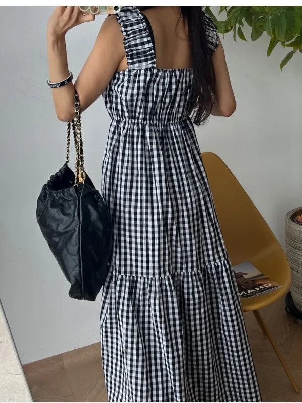 فستان منقوش باللونين الأبيض والأسود بدون حمالات للنساء بخصر فضفاض تنورة متوسطة الطول لربيع الخريف موسم الخريف منتج صيني بدون ...