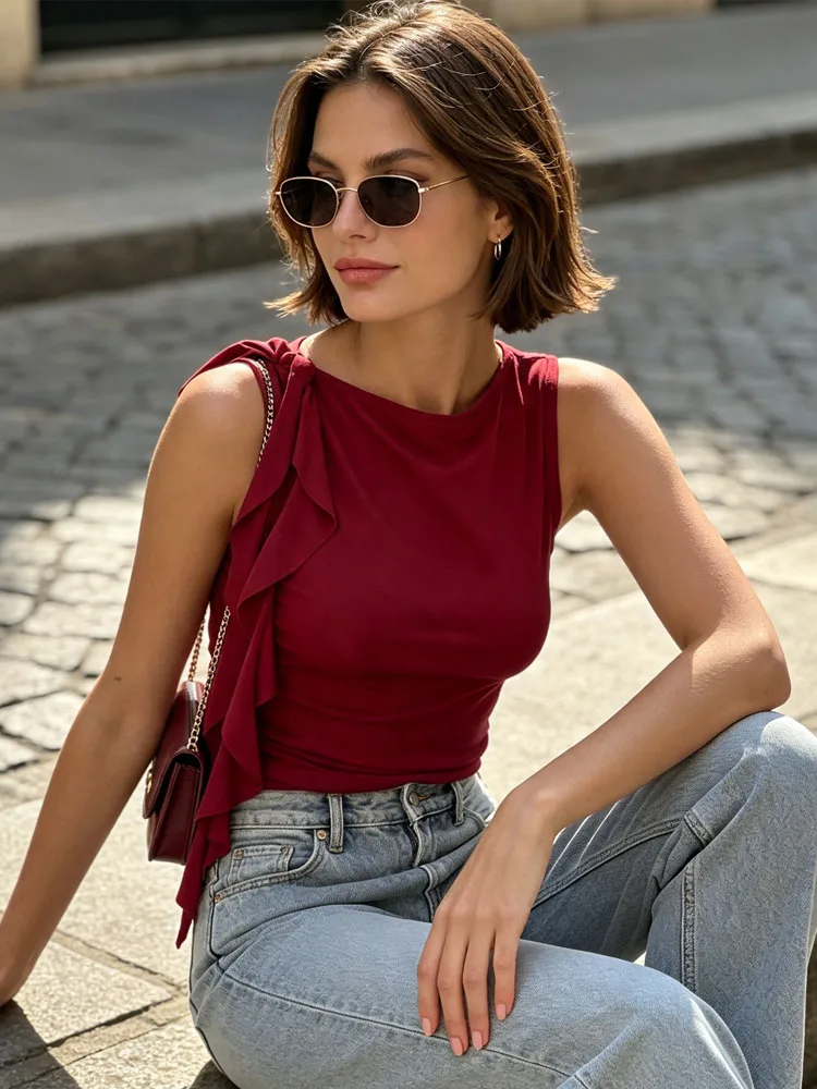 French minimalist sleeveless top for women solid color asymmetrical lotus leaf ribbon details waist cinching slim fit vest