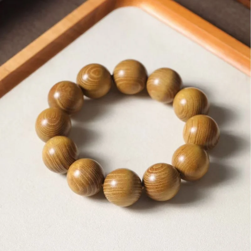 

Authentic Northern Zhe wood small-hole golden sandalwood bracelet with 20mm beads and Buddhist charm accessories