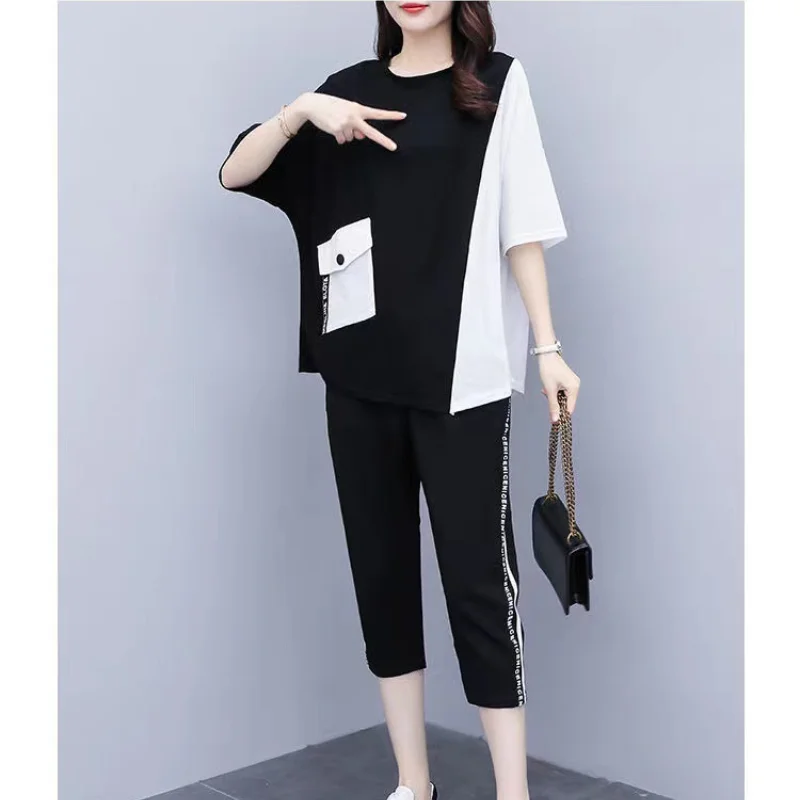 2024 Summer Korean Casual Two-piece Set of Short Sleeved Round Neck Loose T-shirts with Patchwork Elastic Women's Capri Pants