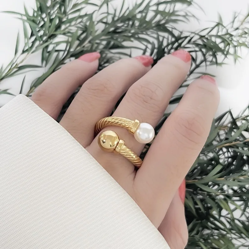 ALLNEWME Elegant Single Simulated Pearl Twisted Open Adjustable Finger Ring For Women Gold PVD Plated Titanium Steel Jewelry