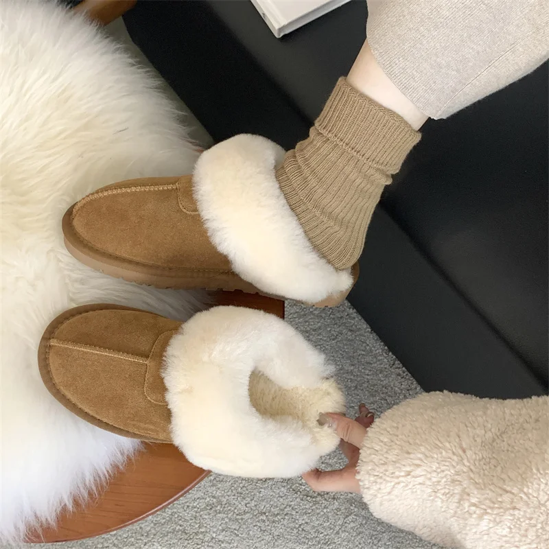 New sheep fur one shoe true wool snow boots warm and fluffy thick sole woolen cotton shoes go out to wear half mop woolen shoes