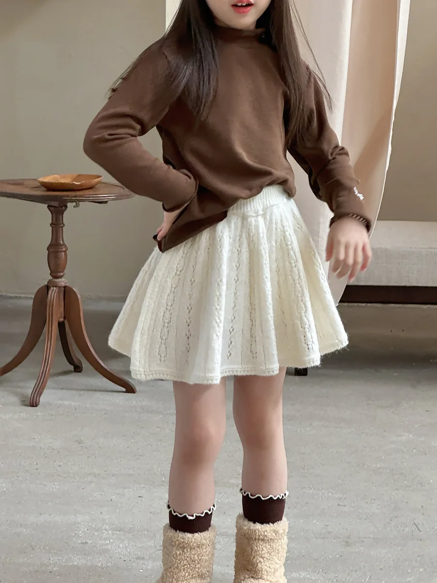 الفتيات نمط المشمش نسيج جوفاء محبوك تنورة الأطفال الخريف والشتاء لطيف الرياح كلمة تنورة