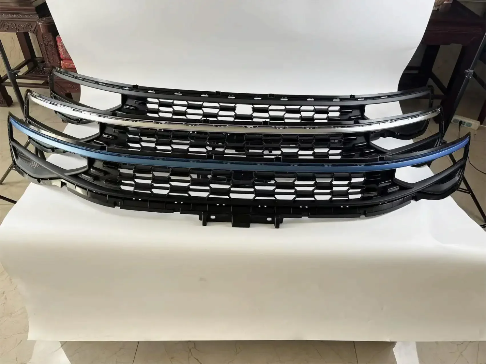 01 Conjunto de malha intermediária da grade superior do para-choque dianteiro 21