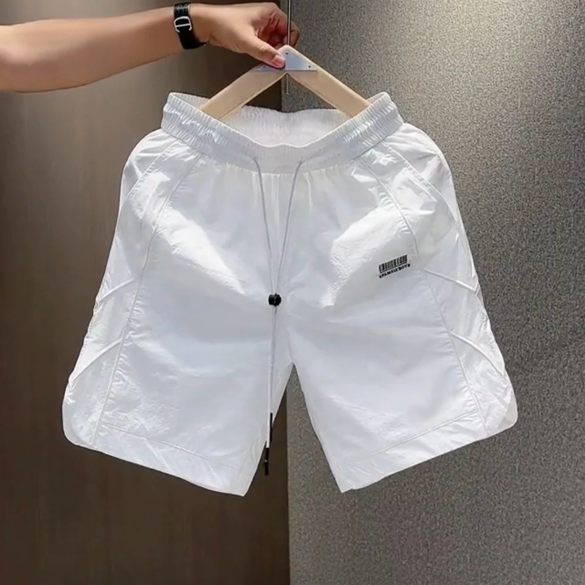 

Qui Dry повседневная мужская ледяная шелковая рта пять четвертей, новинка лета Sle Faion, свободная дышащая лазерная дрель Spor, прямая нога