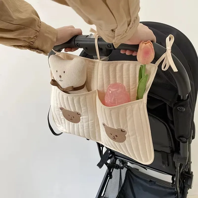 

Baby Storage Bag Carts Storage Bag Diaper Breast Bottle Toy Crib Hanging Bags Multi-Function Portable Strap Pattern Storage Bag