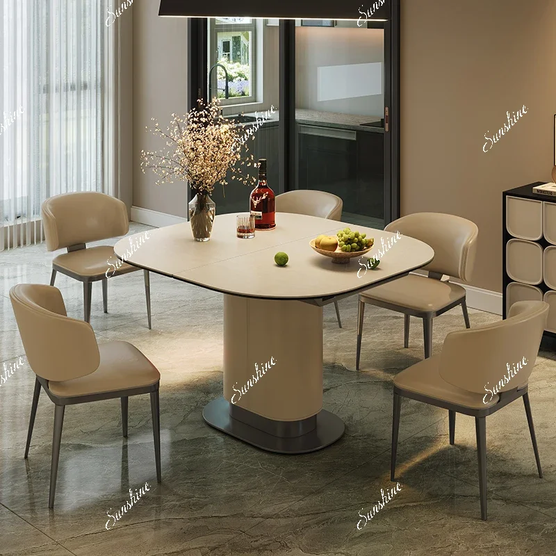 

Italian minimalist retractable imported rock slab dining table saddle leather dining table and chair combination