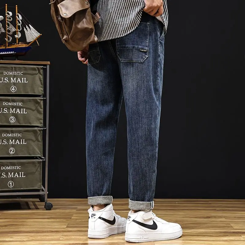 جينز خريفي وشتوي مقاس كبير بخصر مطاطي للرجال، فضفاض بأقدام صغيرة ورباط بالإضافة إلى بنطال هارون متعدد الاستخدامات