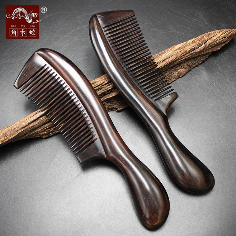 

Ebony black sandalwood comb with fine teeth, handle and curved edges