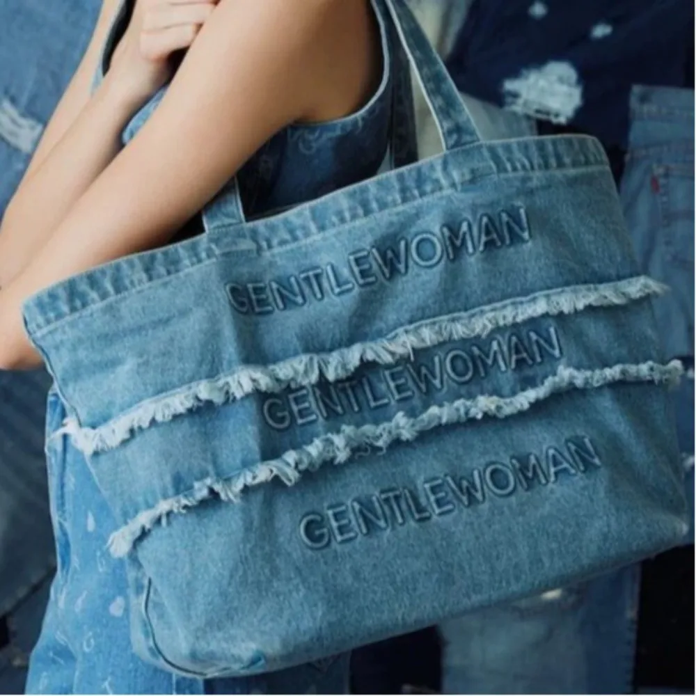 

Vintage American small tassel canvas bag ins Wind big commuter art Single shoulder class Large volume vintage washed denim singl