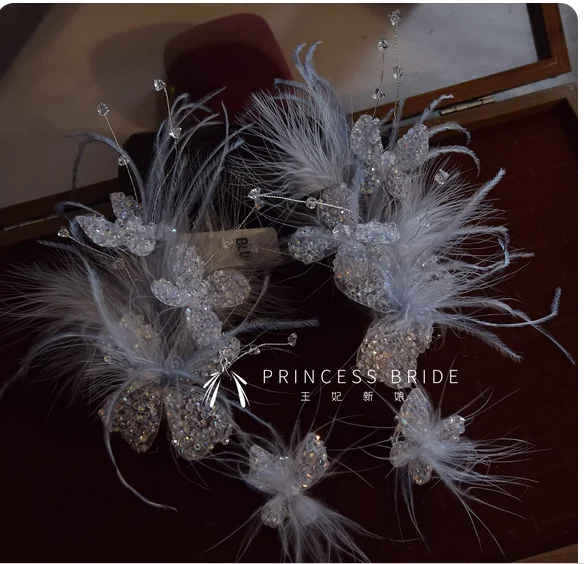 

The original innovative silver-gray feather clip earrings high-end headdress studio with makeup luxury hair dressing morning gow