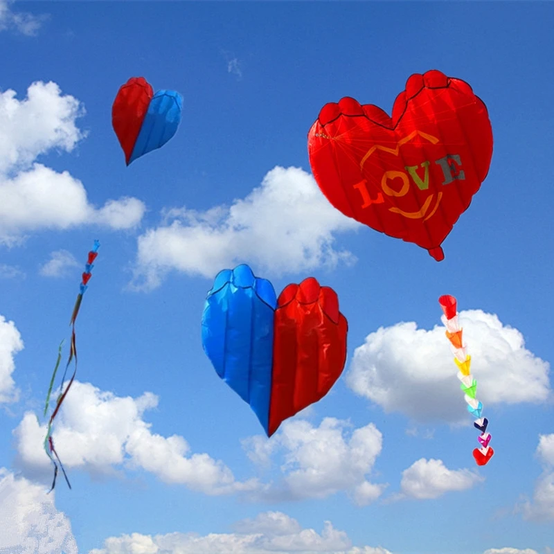 طائرات ورقية جديدة قابلة للنفخ على شكل قلب طائرات ورقية من نسيج النايلون طائرة ورقية توجيه ألعاب خارجية للبالغين طائرات ورقية من مصنع طائرات ورقية طيار