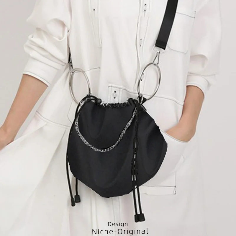 

Cool Black Metal Ring Decoration Niche Ladies Casual Versatile Small Bucket Bag Long Shoulder Strap String Crossbody Bags