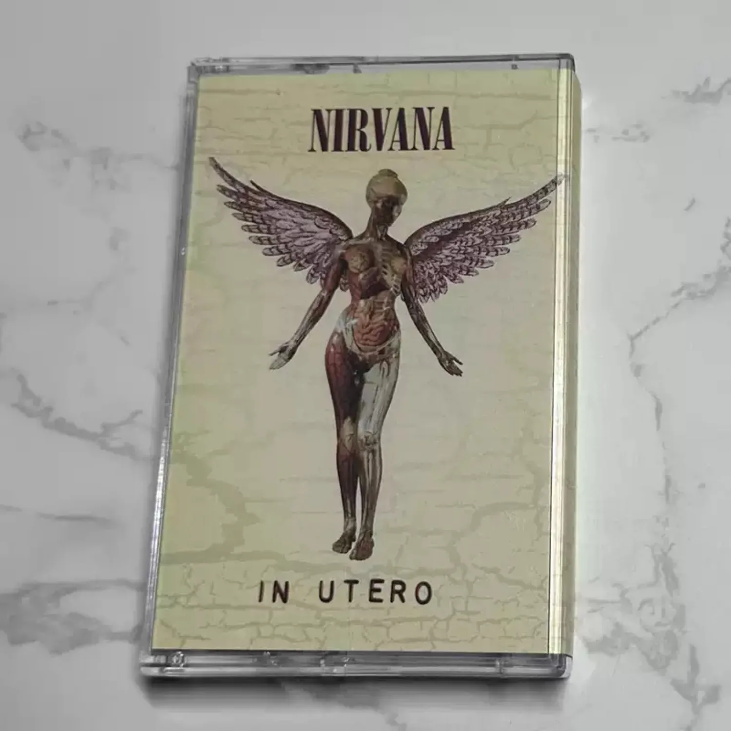Cassette de musique rock alternative rétro, couverture sur le thème de l'art Angel Anatomy, collection de morceaux classiques de style avant-gardiste