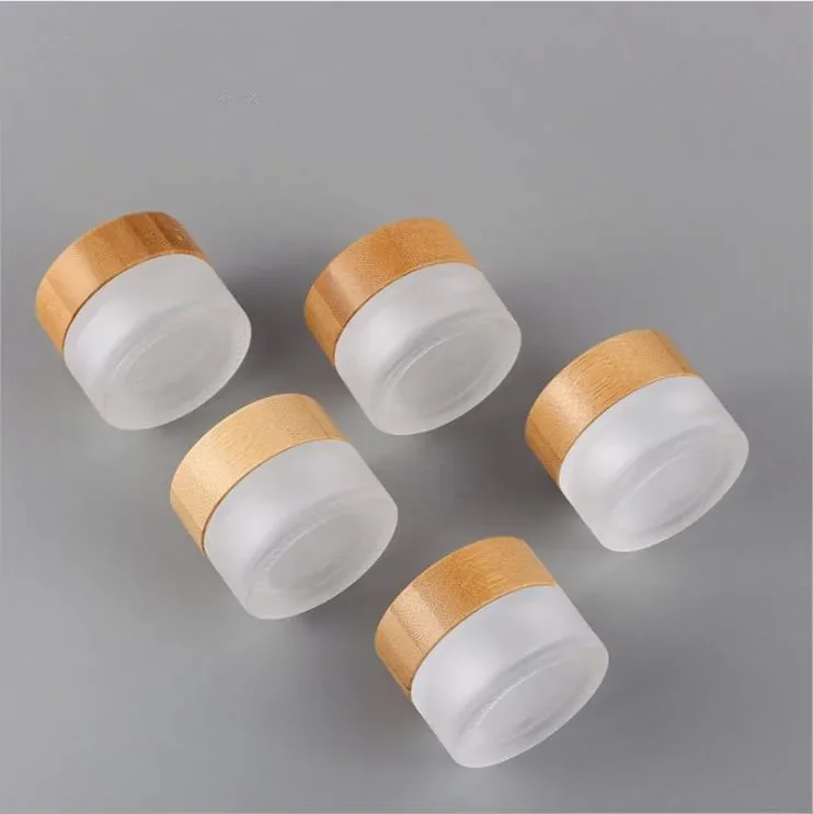 

Refillable bottle frosted glass makeup container jars for cosmetics matte clear Pote De Vidro Com Tampa De Madeira Glass Pot Jar