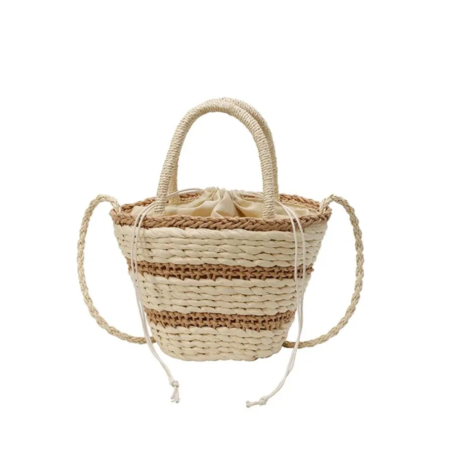 

The new Mori simple straw bag niche rustic wind handheld bucket woven bag versatile single-shoulder diagonal cross women's bags
