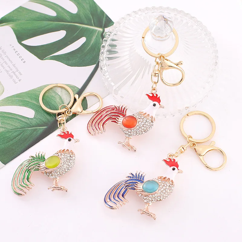 พวงกุญแจรูปตาแมวน่ารัก สีสันสดใส ประดับด้วยหิน ขนาดใหญ่ เหมาะสำหรับผู้หญิง ผู้ชาย พวงกุญแจรถยนต์ เครื่องประดับสำหรับงานปาร์ตี้ งานแต่งงาน ของขวัญสำหรับสาวๆ