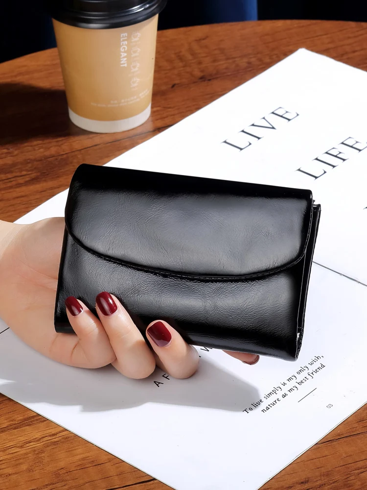leather-coin-purse-women's-versatile-short-size-new-2023-model-tri-fold-large-banknote-clip-pure-cowhide-functional-bag