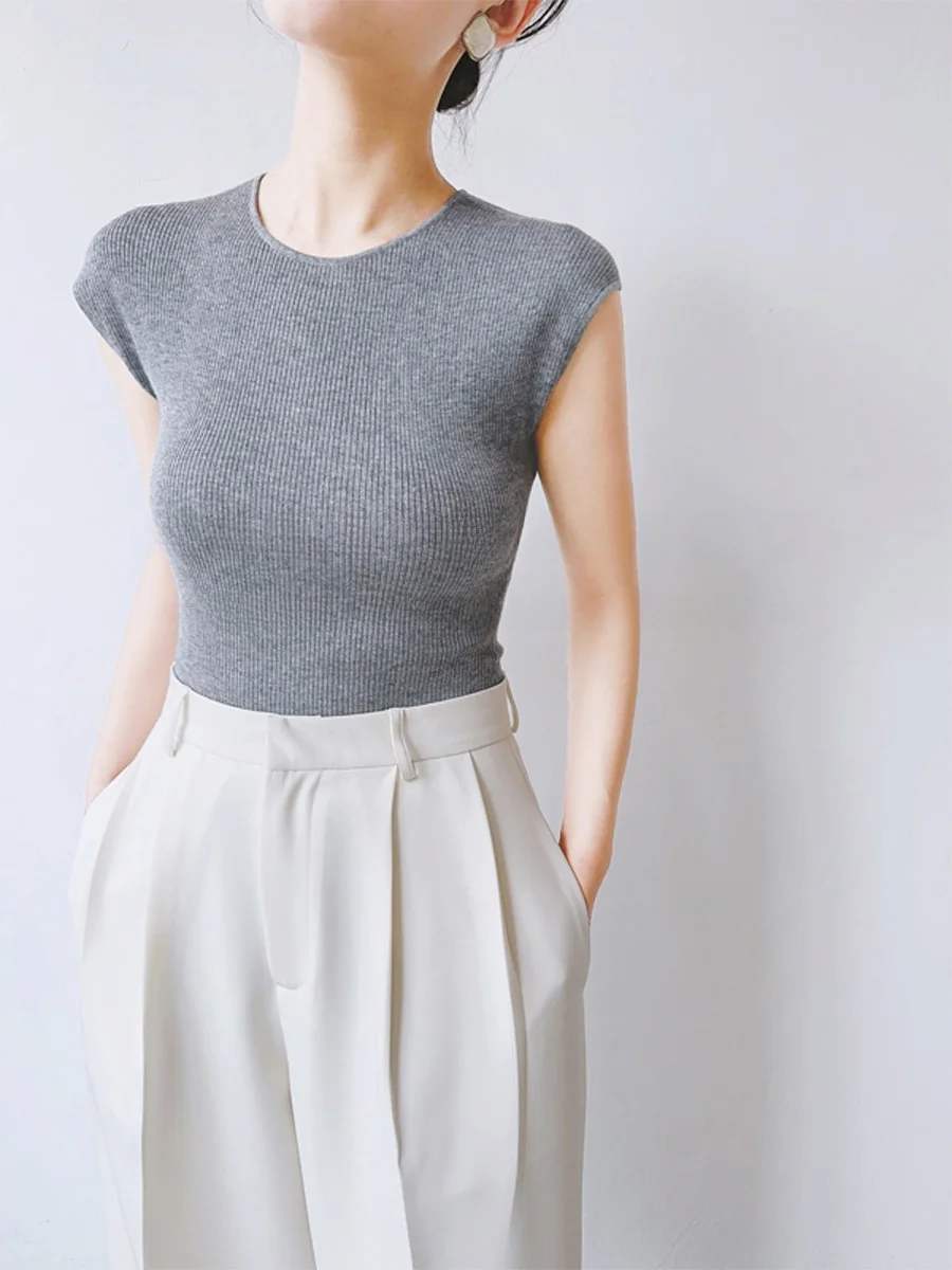 

Женский летний трикотажный топ XALI: комфортный, приятный к телу, простой дизайн, для повседневной носки