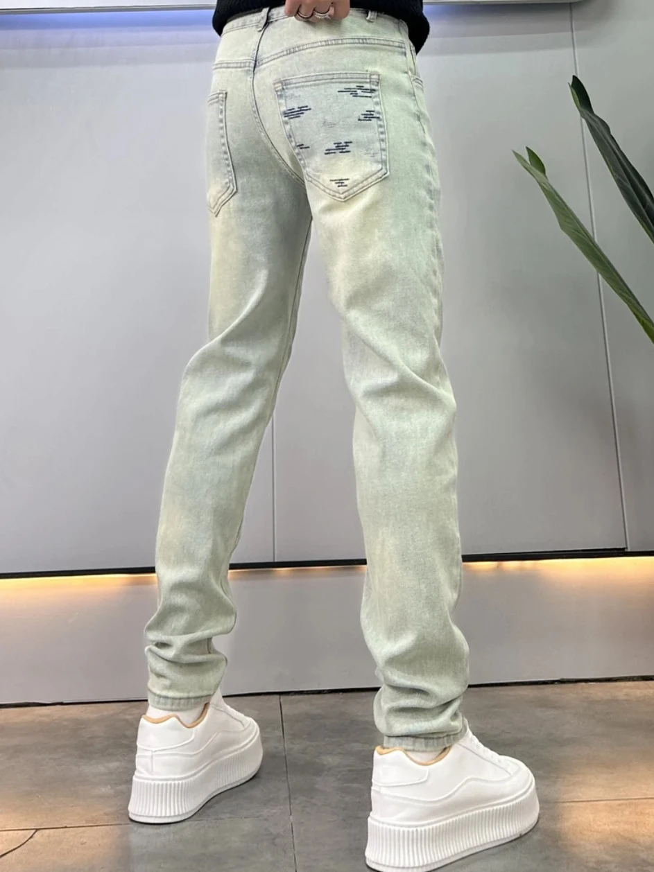 กางเกงยีนส์ผู้ชายสไตล์อเมริกันย้อนยุคทรงสลิมฟิตยืดได้ขาเล็กขายาวแฟชั่นฤดูใบไม้ผลิฤดูใบไม้ร่วงทนทานต่อการสึกหรอสวมใส่สบาย