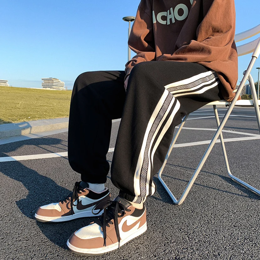 

Spring Summer New Men's Casual Pants Side Stripe Sports Belted Trousers American Sle Cuffed Sweatpants Nine Points Harem Pants