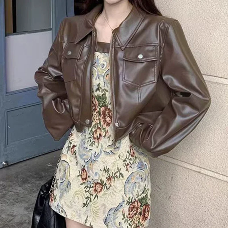 American retro black short leather jacket women's jacket autumn and winter new fashion design sense high sense casual top.
