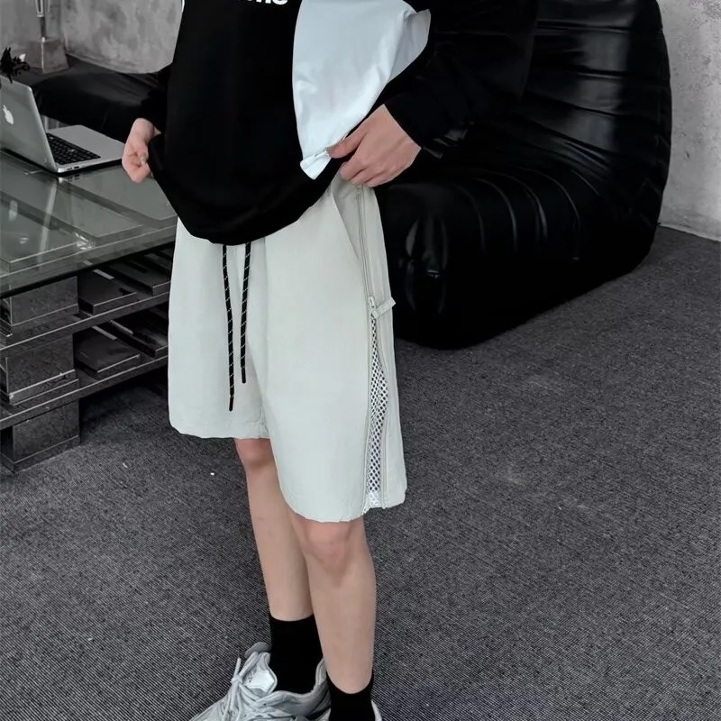 

Сетчатые шорты для мужчин и женщин, новый летний стиль, быстросохнущие рабочие брюки с боковой молнией, чувство дизайна, повседневные брюки «пять четвертей»