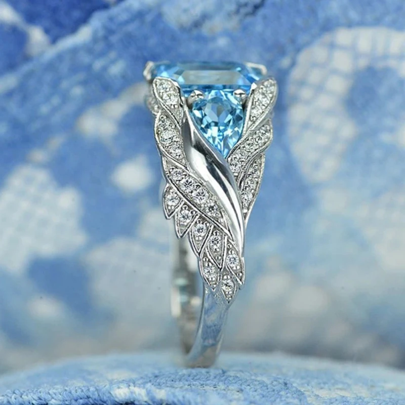 Women's blue square jeweled ring