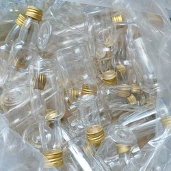 100PCS Mini Liquor Bottles Set 1.7oz Plastic Spirit Bottles Silver/ Gold Caps Alcohol Shot Bottles with Funnels Kraft Tags Rope