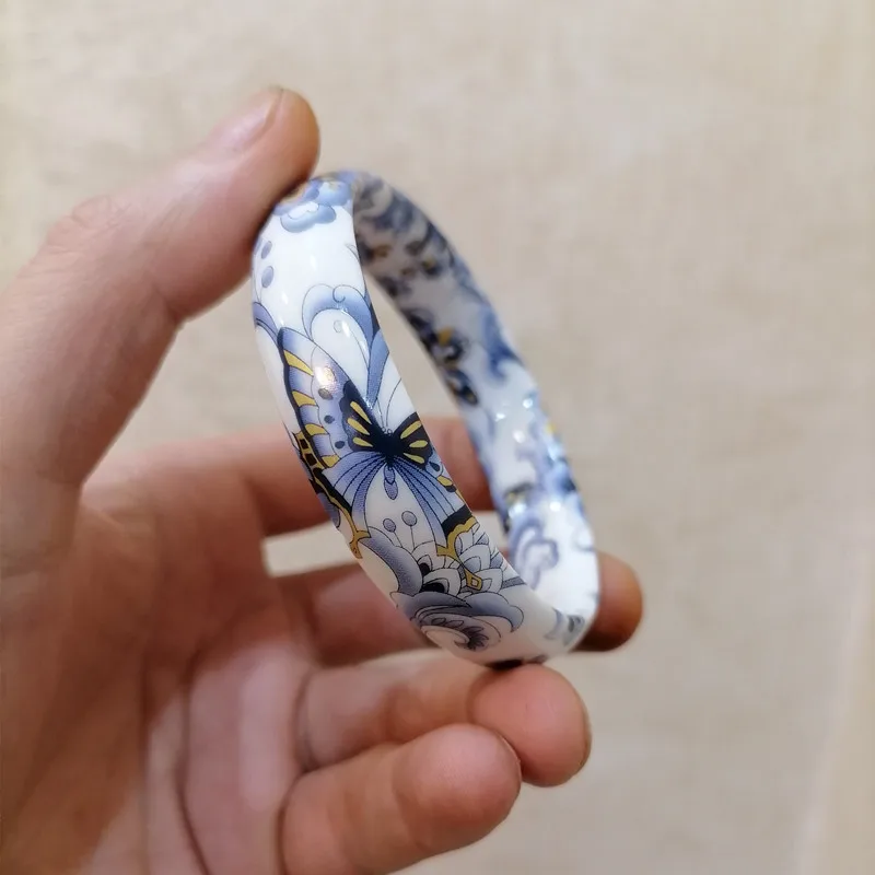 

Chinese Blue and White Porcelain Hand Carved Flat Strip Butterfly Lotus Bracelet Fashion Women Jingdezhen Porcelain Bracelet