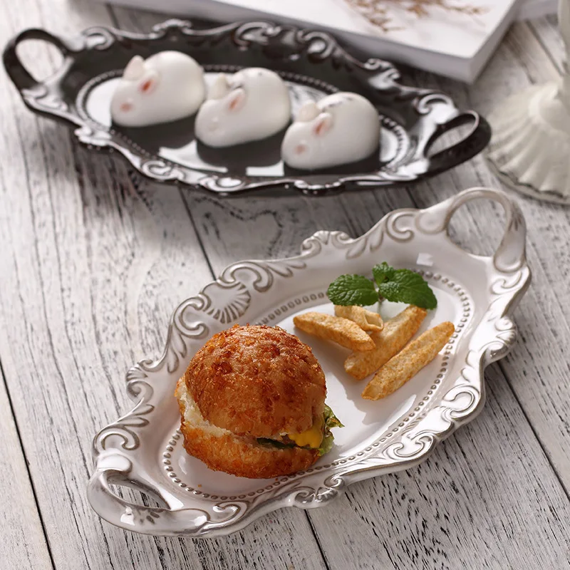 

Creative European-style ceramic tableware dish Western-style dish White glazed kiln glazed embossed binaural dish